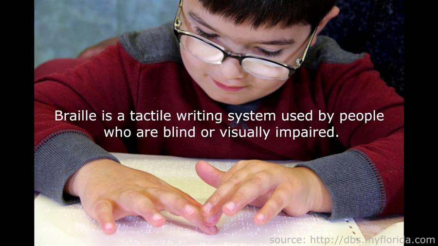 A child reading braille.